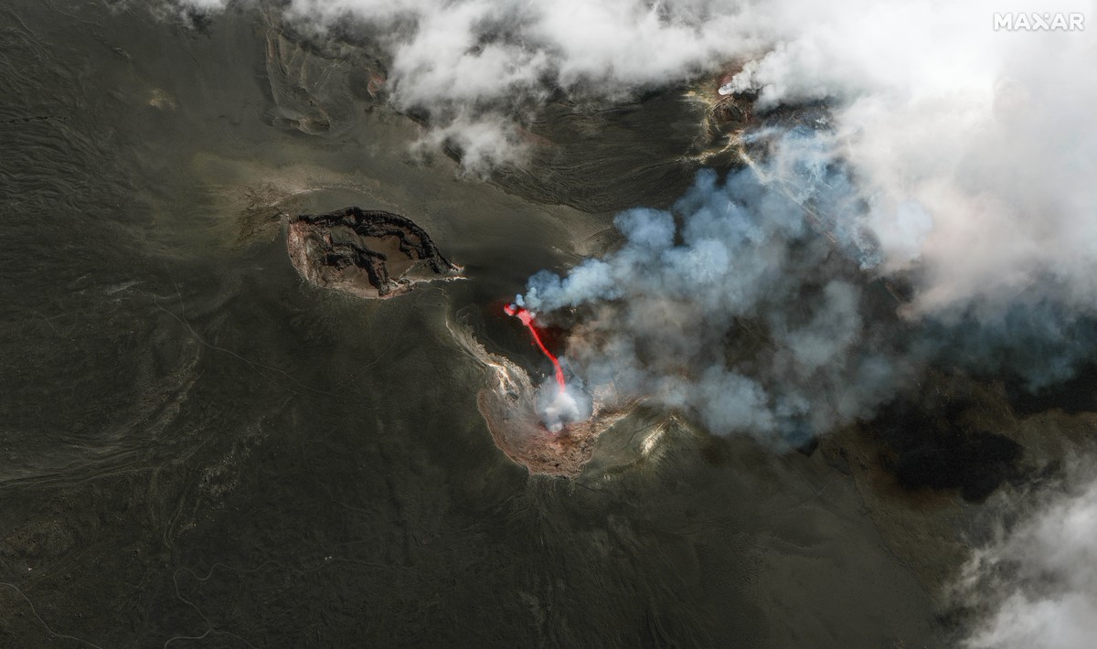 This color infrared image released by Maxar Technologies shows lava flowing from the Mount Etna volcano erupting, in Sicily, Italy, Thursday, July 4, 2024. (Satellite image �2024 Maxar Technologies. v ...