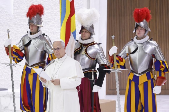 epa12936705 Pope Leo XIV (C) speaks during a swearing-in ceremony at the Paul VI audience hall in the Vatican, 06 May 2026. 28 new recruits of the Pontifical Swiss Guard will take their oath of loyalt ...