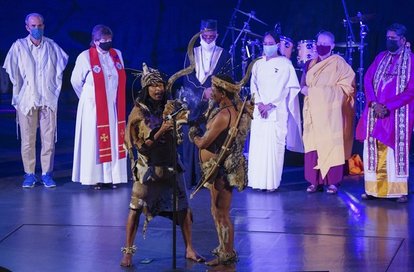 epa09659926 Religious leaders from various faiths offer prayers during an interfaith memorial service for the late Archbishop Emeritus Desmond Tutu at the Cape Town City Hall, South Africa, 29 Decembe ...