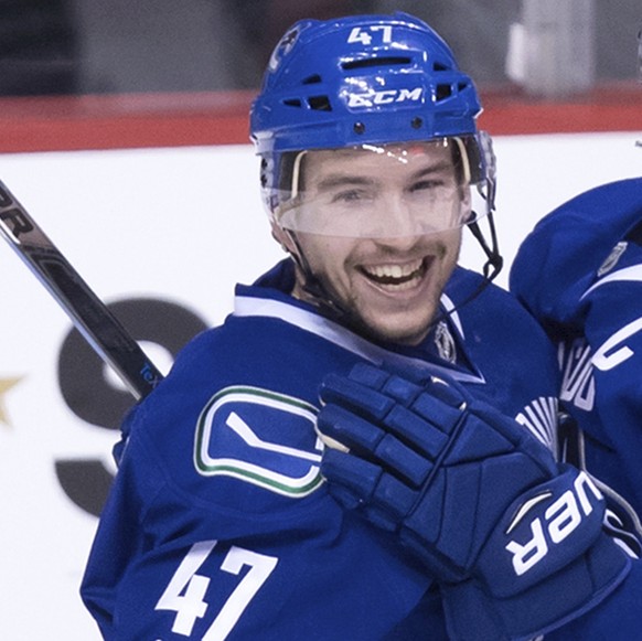 Vancouver Canucks&#039; Sven Baertschi, left, and Henrik Sedin, of Sweden, celebrate Baertschi&#039;s second goal against the Colorado Avalanche during the third period of an NHL hockey game in Vancou ...