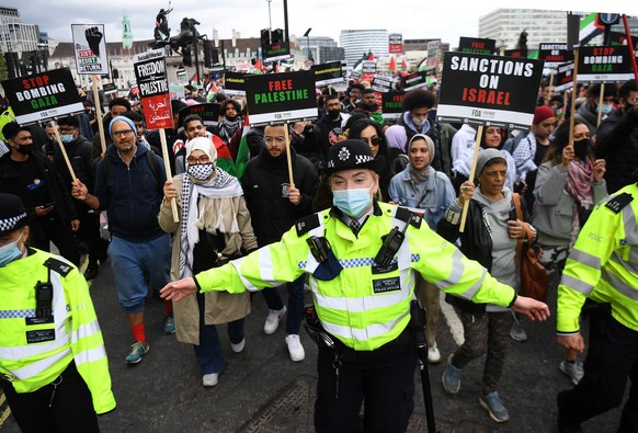 epa09220504 Thousands of supporters of Palestine attend a Palestine solidarity demonstration in central London, Britain, 22 May 2021. Ceasefire between Israel and the Palestinian militant group Hamas  ...