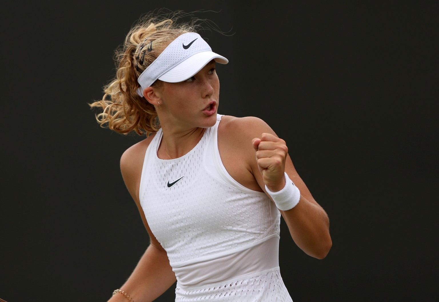 epa10735821 Mirra Andreeva of Russia reacts during her Women&#039;s Singles 4th round match against Anastasia Potapova of Russia at the Wimbledon Championships, Wimbledon, Britain, 09 July 2023. EPA/N ...