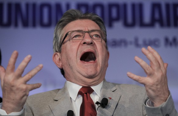 FILE - French far-left candidate Jean-Luc Melenchon comments on preliminary results of the first round of the presidential election in Paris, France, April 10, 2022. Disgruntled left-wing voters whose ...