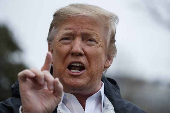 In this March 8, 2019 file photo, President Donald Trump talks with reporters outside the White House in Washington. As a presidential candidate, Donald Trump promised not to cut Social Security, Medi ...
