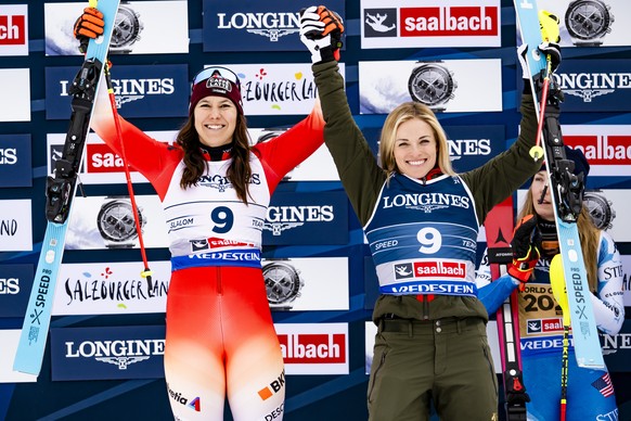 Silver medalists Wendy Holdener of Switzerland and Lara Gut-Behrami of Switzerland celebrate during the podium ceremony of the Women's Team Combined at the 2025 FIS Alpine World Ski Championships ...