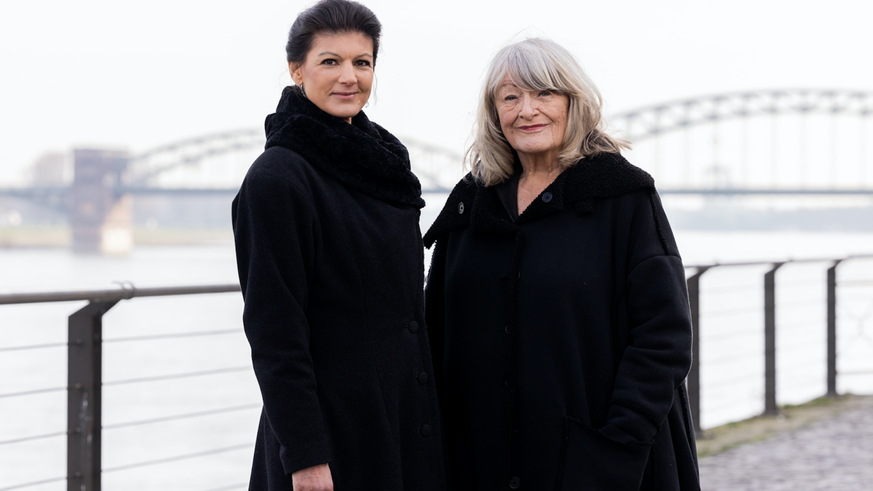 North Rhine-Westphalia, Cologne: Sahra Wagenknecht (Die Linke, l), politician, and Alice Schwarzer, women's rights activist, stand in Rheinauhafen on the Rhine on February 9, 2023.