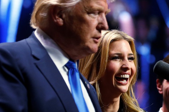 Republican presidential nominee Donald Trump and his daughter Ivanka Trump attend a campaign rally in Manchester, New Hampshire, U.S. November 7, 2016. REUTERS/Carlo Allegri