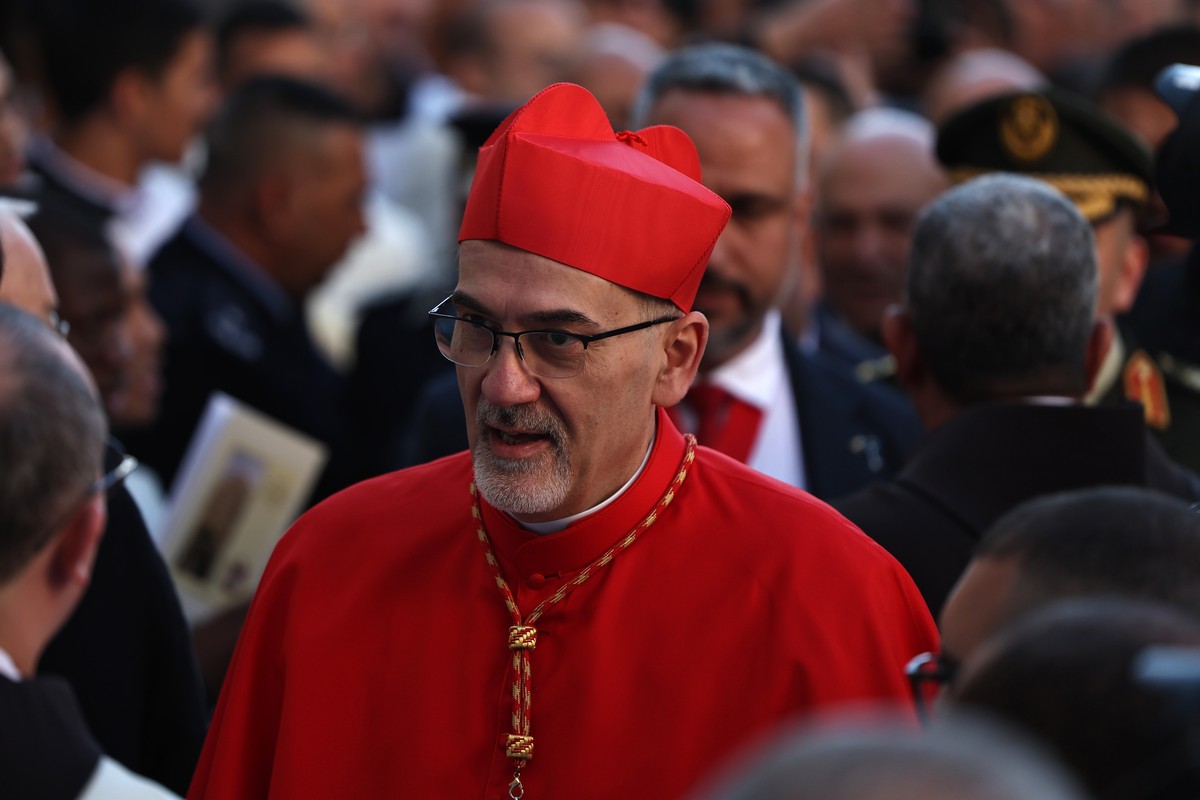 epa12610977 Latin Patriarch of Jerusalem, Cardinal Pizzaballa, attends a Christmas Eve procession in Manger Square leading to the Church of the Nativity during Christmas celebrations in the West Bank  ...