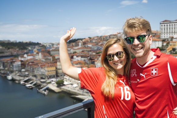 Supporters from Switzerland pose in the street before the UEFA Nations League semi-final soccer match between Portugal and Switzerland at the Dragao stadium in Porto, Portugal, on Wednesday, June 5, 2 ...