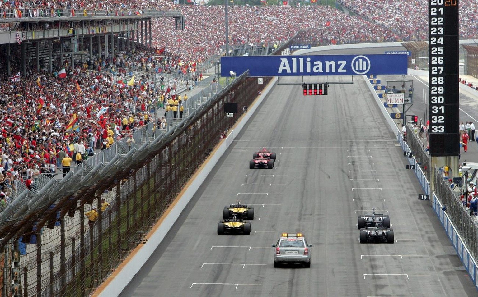 Only Ferarri, Jordan and Minardi teams race cars takes start on the grid at the US Grand Prix at race track in Indianapolis, USA, Sunday 19 June 2005. All Michelin user teams quit the race after the i ...