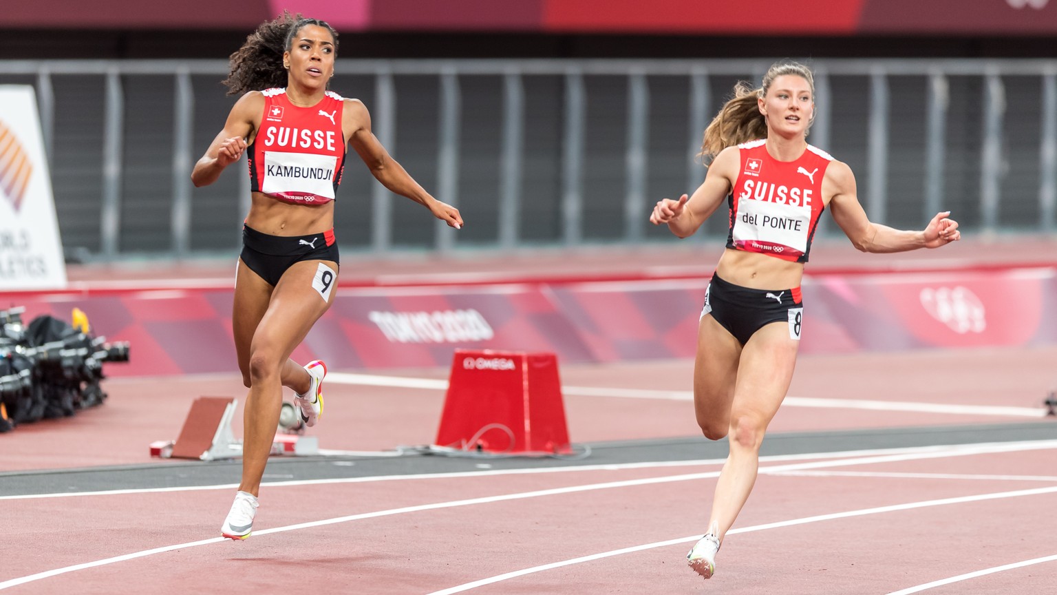 Ajla Del Ponte, right, and Mujinga Kambundji, left, finish the final of the women's 100 m in ranks five (Del Ponte) and six (Kambundji) at the 2020 Tokyo Summer Olympics Games in Tokyo, Japan, on Satu ...