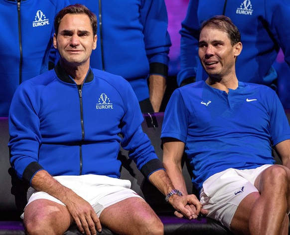 Mandatory Credit: Photo by Ella Ling/Shutterstock 13413997fm Roger Federer and Rafael Nadal of Team Europe emotional, holding hands, watching a video montage after their Men s Doubles match, the final ...