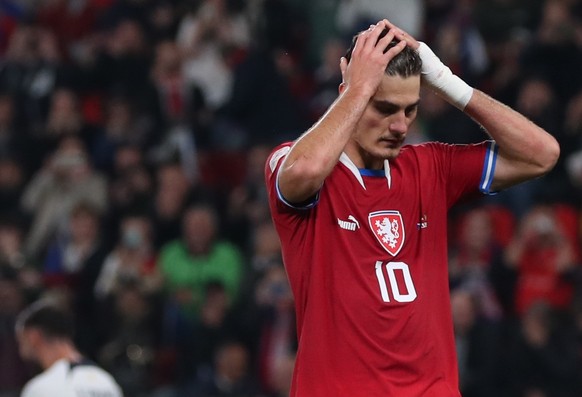 epa10204334 Patrik Schick of Czech Republic reacts after missing a penalty during the UEFA Nations League soccer match between the Czech Republic and Portugal in Prague, Czech Republic, 24 September 2 ...