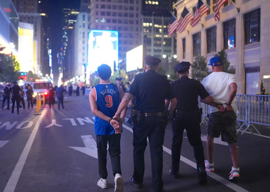 NEW YORK, UNITED STATES - JUNE 5: Thousands of New York Knicks fans gather inside and outside Madison Square Garden and celebrate across New York City after the team's NBA Finals Game 2 victory o ...