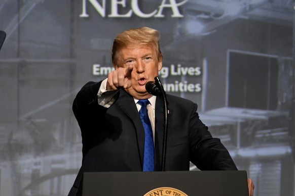 epa07065025 US President Donald J. Trump delivers a speech at the National Electrical Contractors Convention, in Philadelphia, Pennsylvania, USA, 02 October 2018. EPA/BASTIAAN SLABBERS