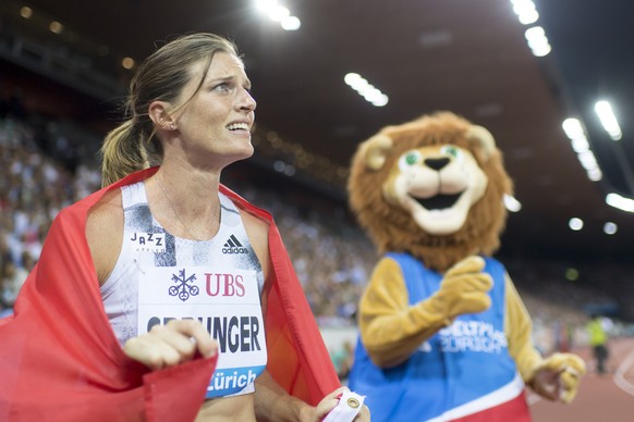 Lea Sprunger from Switzerland reacts after the women&#039;s 400m hurdles race, during the Weltklasse IAAF Diamond League international athletics meeting in the stadium Letzigrund in Zurich, Switzerlan ...