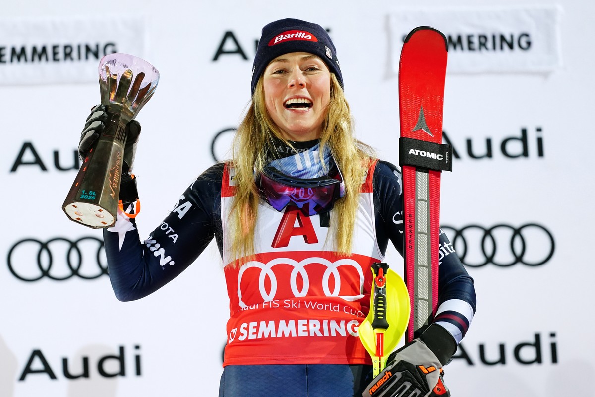United States' Mikaela Shiffrin, winner of an alpine ski, women's World Cup slalom, poses with the trophy in Semmering, Austria, Sunday, Dec. 28, 2025. (AP Photo/Pier Marco Tacca)
Austria Wo ...