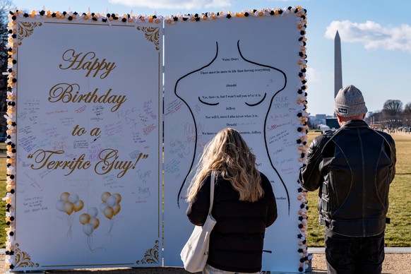 People look at a protest art installation to highlight Jeffrey Epstein's birthday of Jan. 20, 1953, on the National Mall, Monday, Jan. 19, 2026, in Washington. (AP Photo/Alex Brandon)
Justice Dep ...