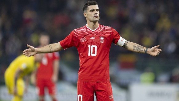 Switzerland's Granit Xhaka reacts during the UEFA Euro 2024 qualifying group I soccer match between Romania and Switzerland at the National Arena stadium in Bucharest, Romania, Tuesday, November  ...