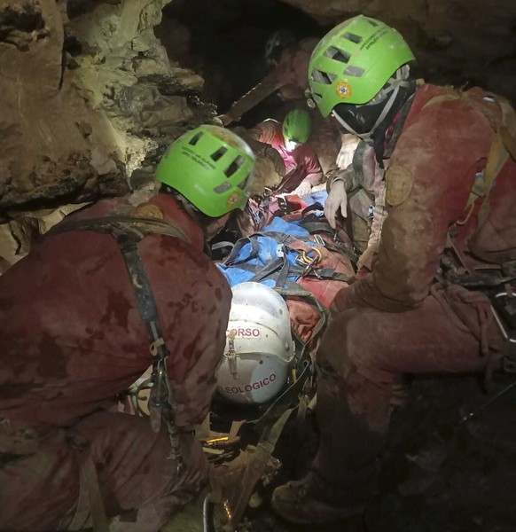 This image released Monday, Dec. 16, 2024 by the Italian Soccorso Alpino (Alpine Rescue) shows the rescue operation of Ottavia Piana, a caver blocked in a deep inside the Bueno Fonteno cave, near Berg ...