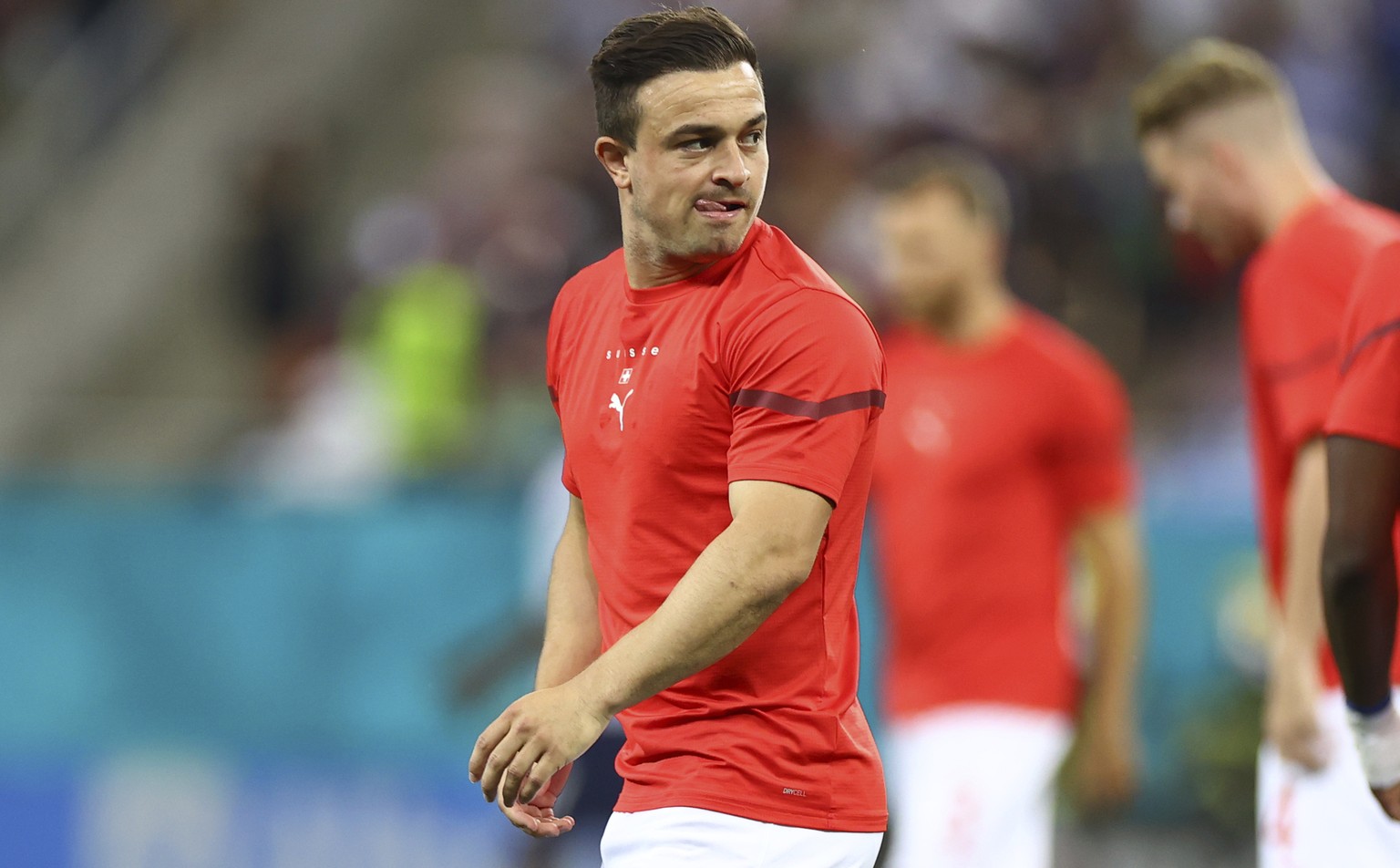 Switzerland&#039;s Xherdan Shaqiri gestures as warms up ahead of the Euro 2020 soccer championship round of 16 match between France and Switzerland at the National Arena stadium, in Bucharest, Romania ...