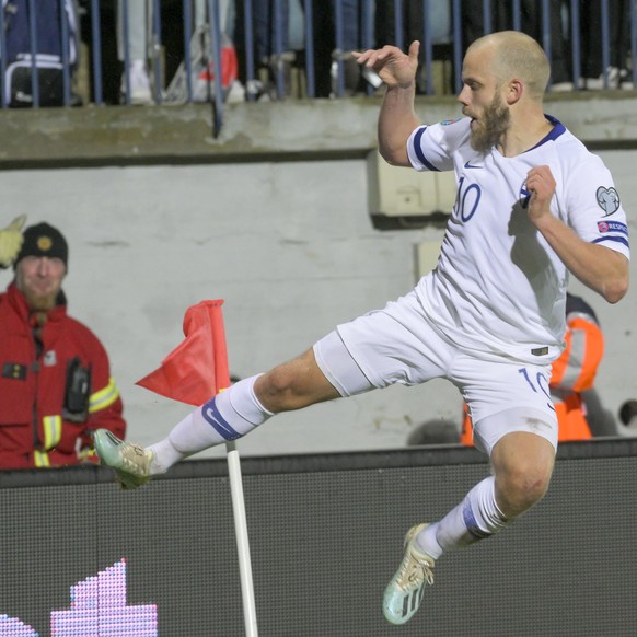 epa07923268 Teemu Pukki (R) of Finland celebrates a goal during the UEFA EURO 2020 qualifiers match between Finland and Armenia at the Veritas Stadium in Turku, Finland, 15 October 2019. EPA/MAURI RAT ...