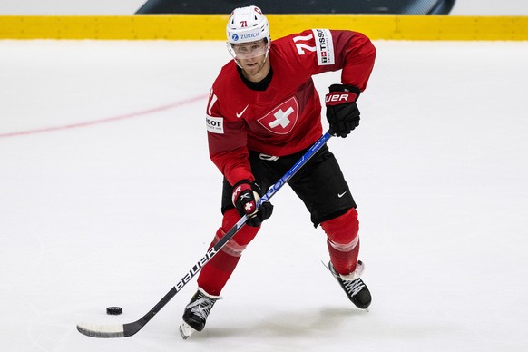 Switzerland&#039;s Enzo Corvi in action during the Ice Hockey World Championship group A preliminary round match between Switzerland and Italy in Helsinki at the Ice Hockey Hall, Finland on Saturday,  ...
