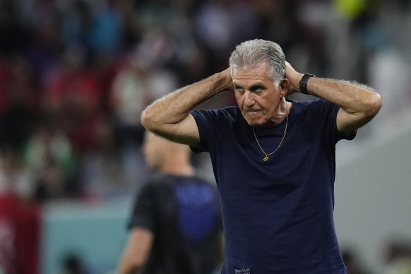 Iran's head coach Carlos Queiroz grimaces during the World Cup group B soccer match between Iran and the United States at the Al Thumama Stadium in Doha, Qatar, Tuesday, Nov. 29, 2022. (AP Photo/Manu ...