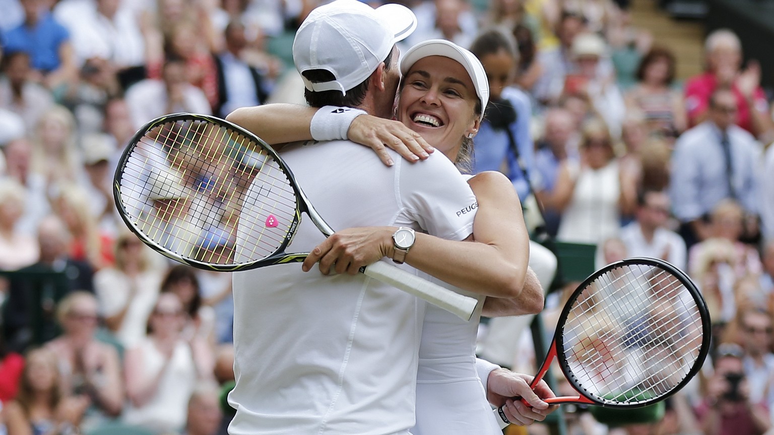 Martina Hingis of Switzerland and Jamie Murray of Great Britain celebrate after winning their mixed doubles final match against Henri Kontinen of Finland and Heather Watson of Great Britain during the ...