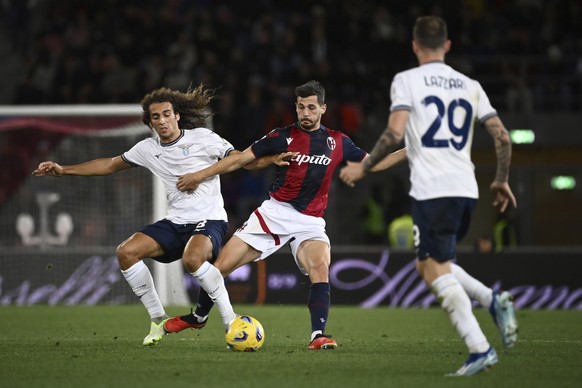 Lazio&#039;s Matteo Guendouzi, left, competes for the ball with Bologna&#039;s Remo Freuler during the Italian Serie A soccer match between Bologna and Lazio at the Stadio Renato Dall&#039;Ara in Bolo ...