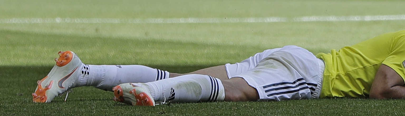 Colombia&#039;s Radamel Falcao lays on the pitch during the group H match between Colombia and Japan at the 2018 soccer World Cup in the Mordavia Arena in Saransk, Russia, Tuesday, June 19, 2018. (AP  ...