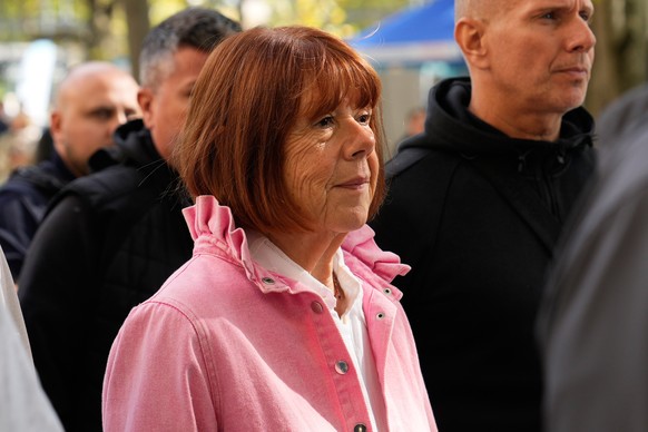 Gisele Pelicot leaves the courthouse for a break during the appeals trial in the case of a man challenging his conviction, less than a year after the landmark verdict in a drugging and rape trial that ...