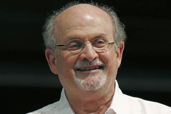 FILE - Author Salman Rushdie appears during the Mississippi Book Festival in Jackson, Miss., on Aug. 18, 2018. The U.S. is imposing financial penalties on an Iranian-based organization that raised mon ...