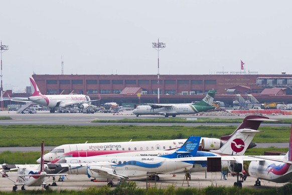 A general view of Tribhuvan International airport in Kathmandu, Nepal, Sunday, May 29, 2022. A small airplane with 22 people on board flying on a popular tourist route was missing in Nepal