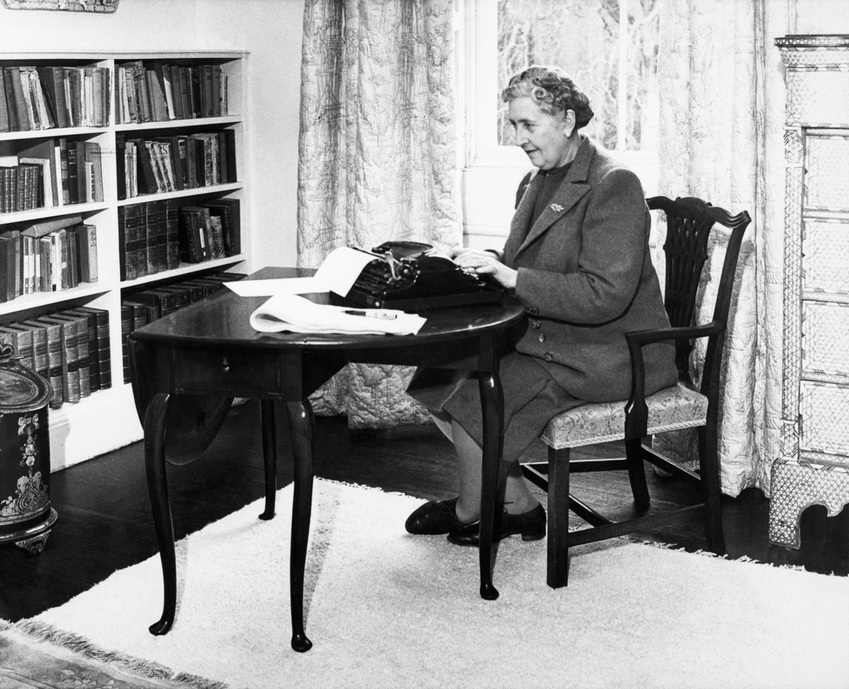 English detective novelist, Agatha Christie (1890 - 1976) typing at her home, Greenway House, Devon, January 1946.