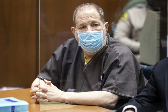Harvey Weinstein, the 69-year-old convicted rapist and disgraced movie mogul, wears a face mask as he listens in court during a pre-trial hearing in Los Angeles, Thursday, July 29, 2021. Weinstein ple ...