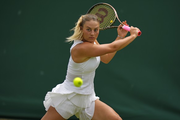 Ukraine&#039;s Marta Kostyuk returns to China&#039;s Shuai Zhang during a women&#039;s singles match on day three of the Wimbledon tennis championships in London, Wednesday, June 29, 2022. (AP Photo/A ...