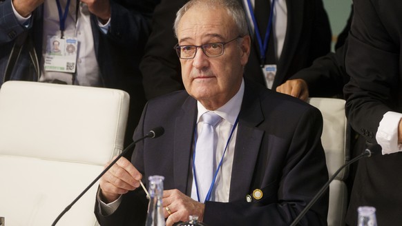 epa12458729 The Vice President and Federal Councilor of Switzerland, Guy Parmelin during a meeting of the Development Committee at the World Bank Group-IMF 2025 Annual Meetings in Washington, DC, USA, ...