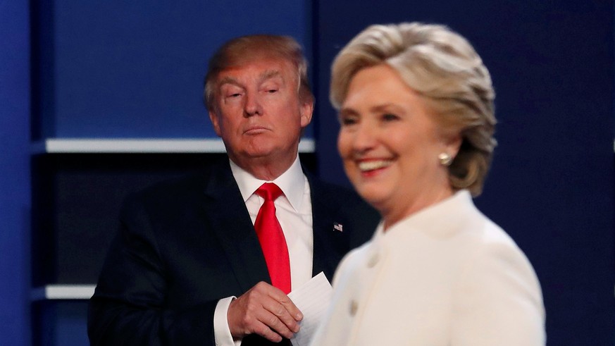 Republican U.S. presidential nominee Donald Trump and Democratic U.S. presidential nominee Hillary Clinton finish their third and final 2016 presidential campaign debate at UNLV in Las Vegas, Nevada,  ...