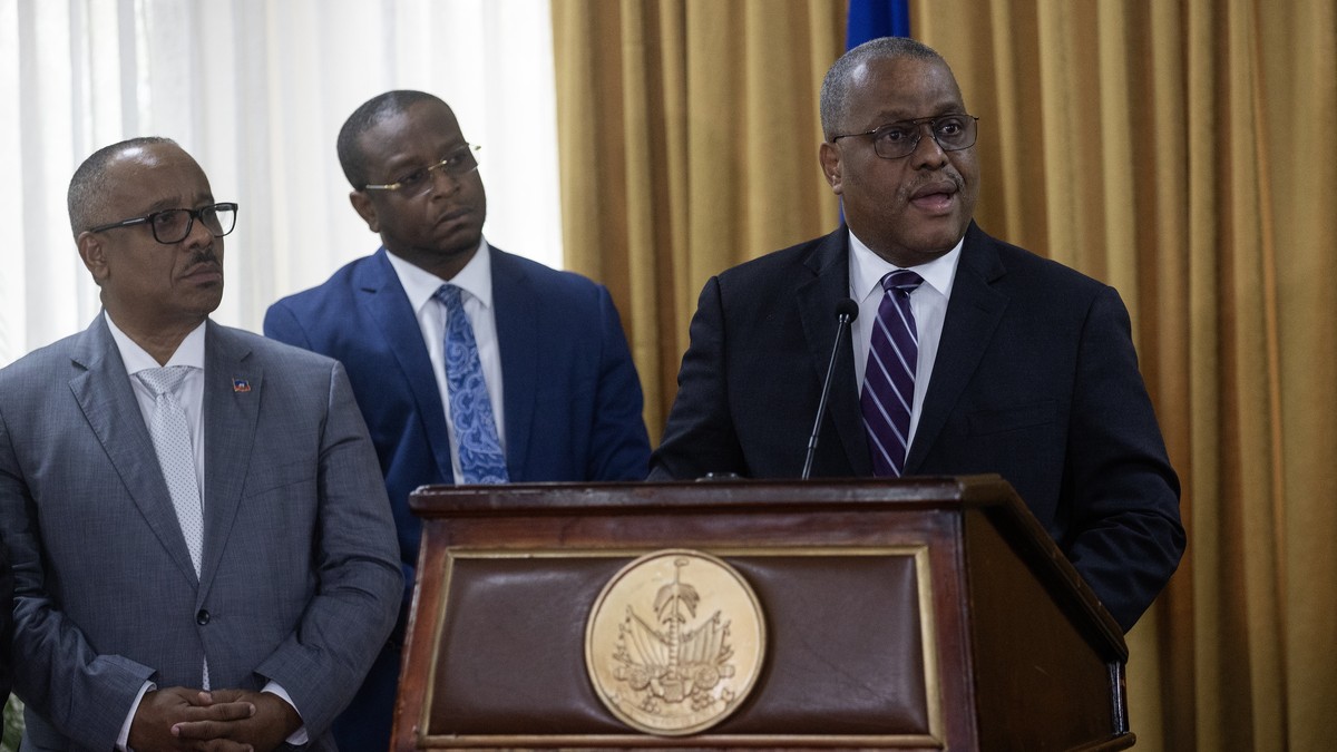 epa11388226 Haitian Prime Minister-designate Garry Conille speaks before the members of the Presidential council of transition during the official presentation of the extension of the decree of his de ...