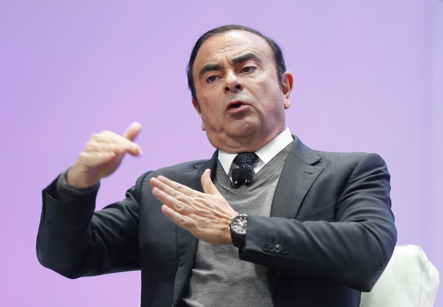 FILE - In this Jan. 9, 2017, file photo, Carlos Ghosn, Chairman of the Board and Chief Executive Officer of Nissan Motor Co., Ltd., speaks at the North American International Auto Show in Detroit. Nis ...