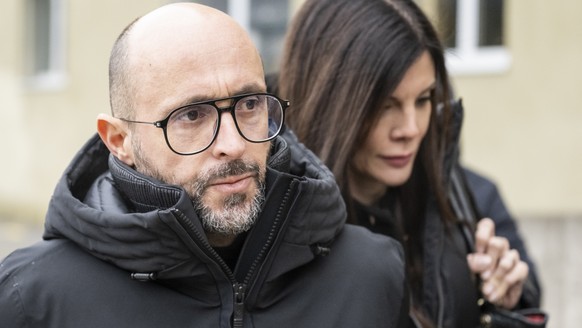 epa12726283 The owners of 'Le Constellation' bar in Crans-Montana, Jacques (L), and Jessica Moretti of France, arrive to a hearing before the public prosecutor of the canton of Valais, follo ...