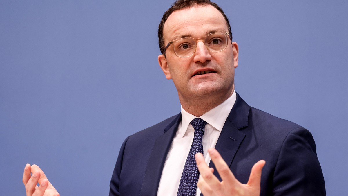 epa09591055 German Health Minister Jens Spahn attends a press conference about the current pandemic Covid-19 situation, in Berlin, Germany, 19 November 2021. As the number of infections continues to r ...