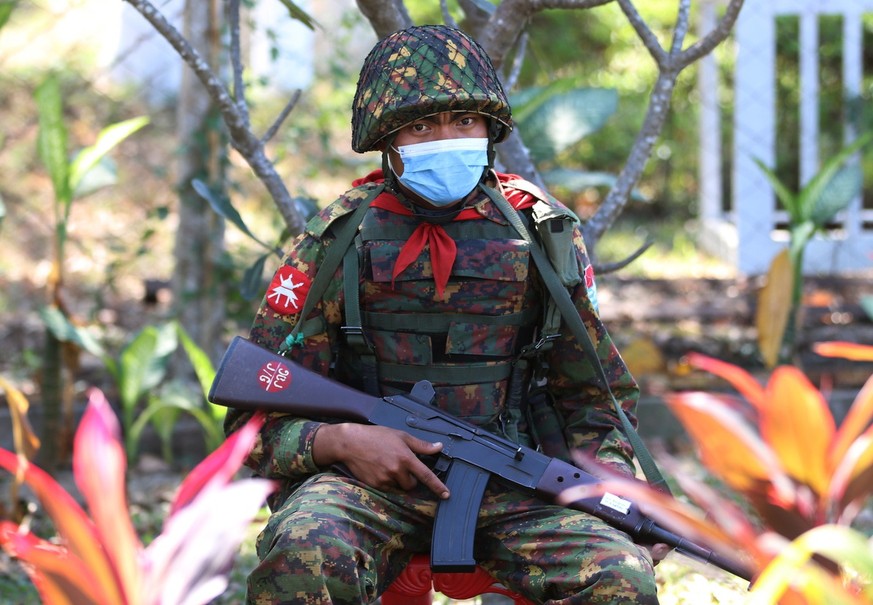 epa08983733 A soldier guards the entrance of the municipal guest house where newly elected parliament members are staying in Naypyitaw, Myanmar, 03 February 2021. Myanmar&#039;s military seized power  ...