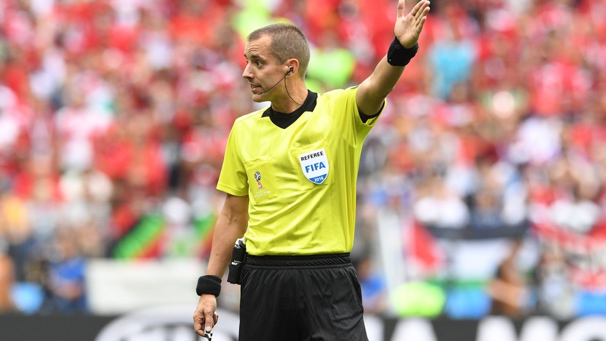 epa06824357 US referee Mark Geiger reacts during the FIFA World Cup 2018 group B preliminary round soccer match between Portugal and Morocco in Moscow, Russia, 20 June 2018.

(RESTRICTIONS APPLY: Ed ...