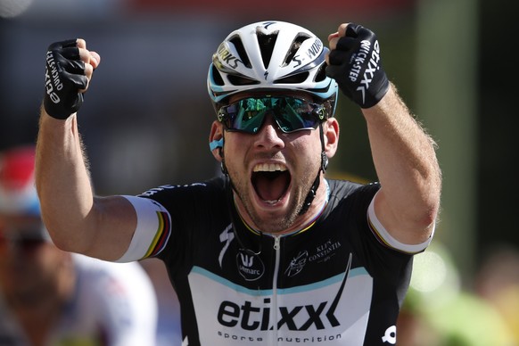 Etixx-Quick Step rider Mark Cavendish of Britain celebrates as he crosses the finish line to win the 190.5-km (118.4 miles) 7th stage of the 102nd Tour de France cycling race from Livarot to Fougeres, ...