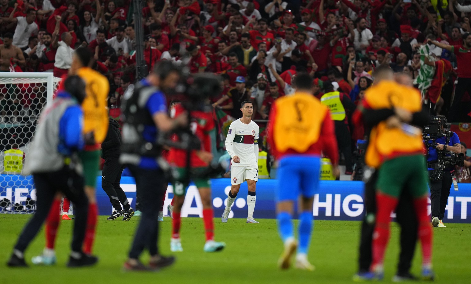 Portugal&#039;s Cristiano Ronaldo, centre, reacts end of the World Cup quarterfinal soccer match between Morocco and Portugal, at Al Thumama Stadium in Doha, Qatar, Saturday, Dec. 10, 2022. (AP Photo/ ...