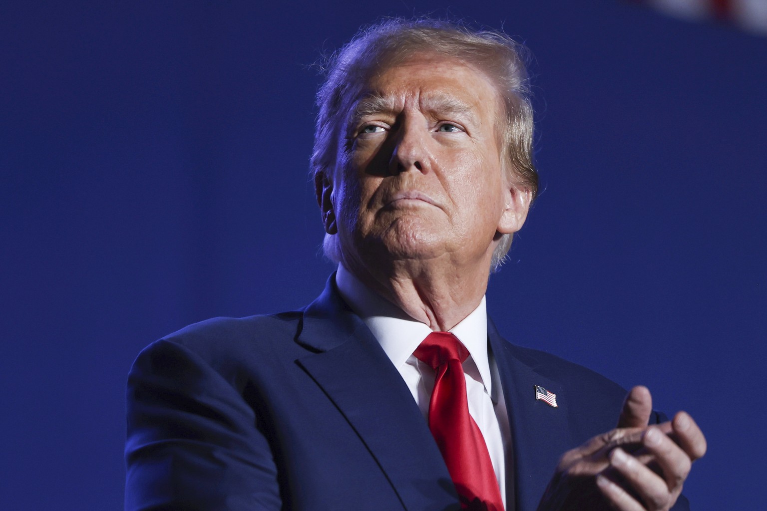FILE - Former President Donald Trump speaks at a campaign rally, Saturday, Dec. 16, 2023, in Durham, N.H. Trump is facing criticism for repeatedly harnessing rhetoric once used by Adolf Hitler to argu ...