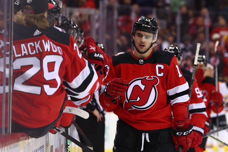 NHL, Eishockey Herren, USA Boston Bruins at New Jersey Devils Dec 28, 2022 Newark, New Jersey, USA New Jersey Devils center Nico Hischier 13 celebrates his goal against the Boston Bruins during the th ...