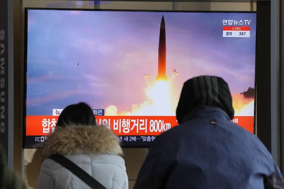 People watch a TV showing a file image of North Korea&#039;s missile launch during a news program at the Seoul Railway Station in Seoul, South Korea, Sunday, Jan. 30, 2022. North Korea on Sunday fired ...